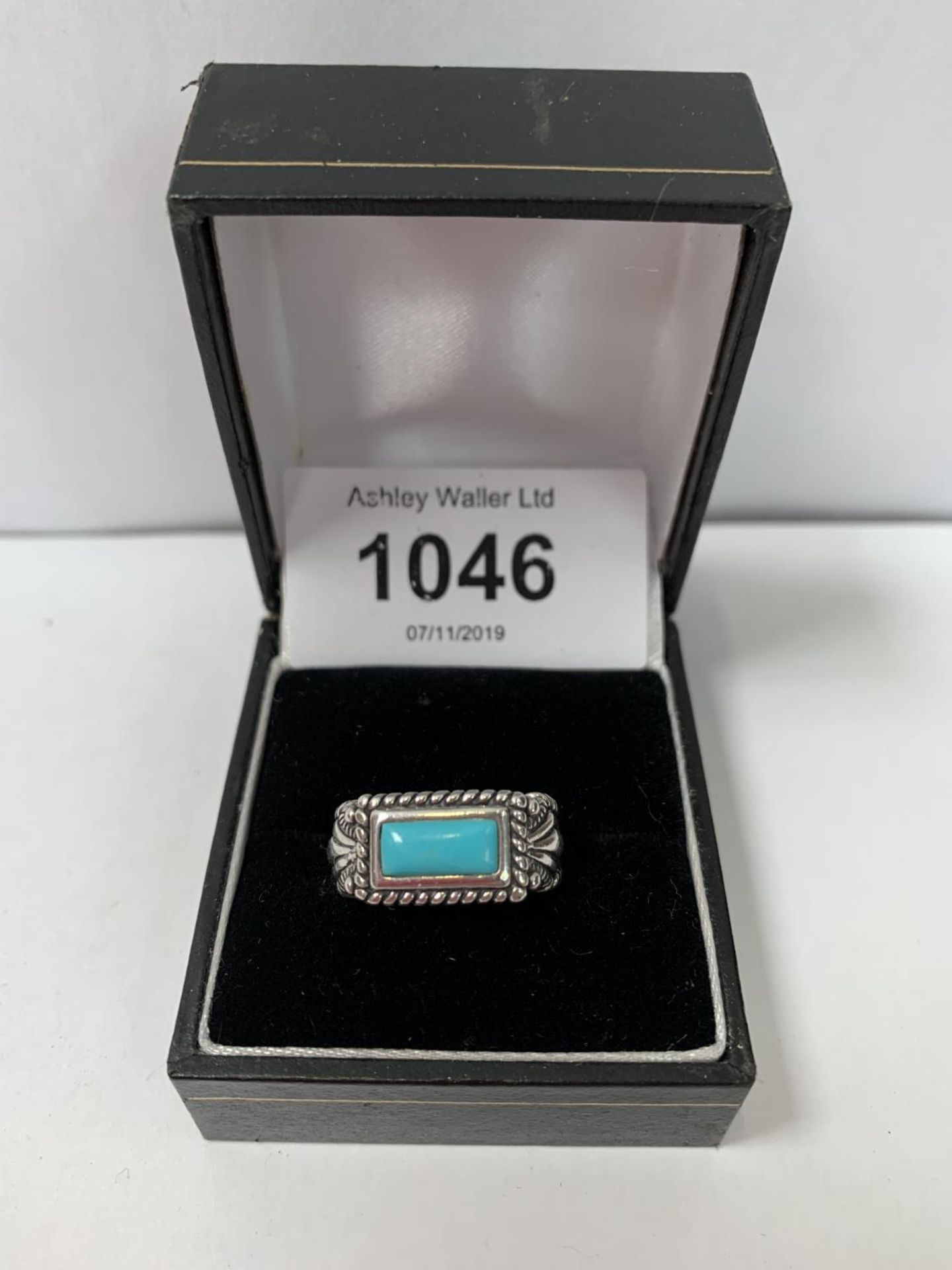 AN AMERICAN SILVER NAVAJO BLUE STONE RING