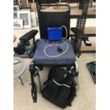 AN INVACARE STORM 3 EURO ELECTRIC WHEELCHAIR IN WORKING ORDER WITH BATTERY CHARGER