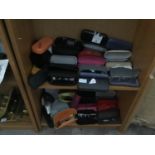 A LARGE QUANTITY OF NEW GLASSES WITH CASES