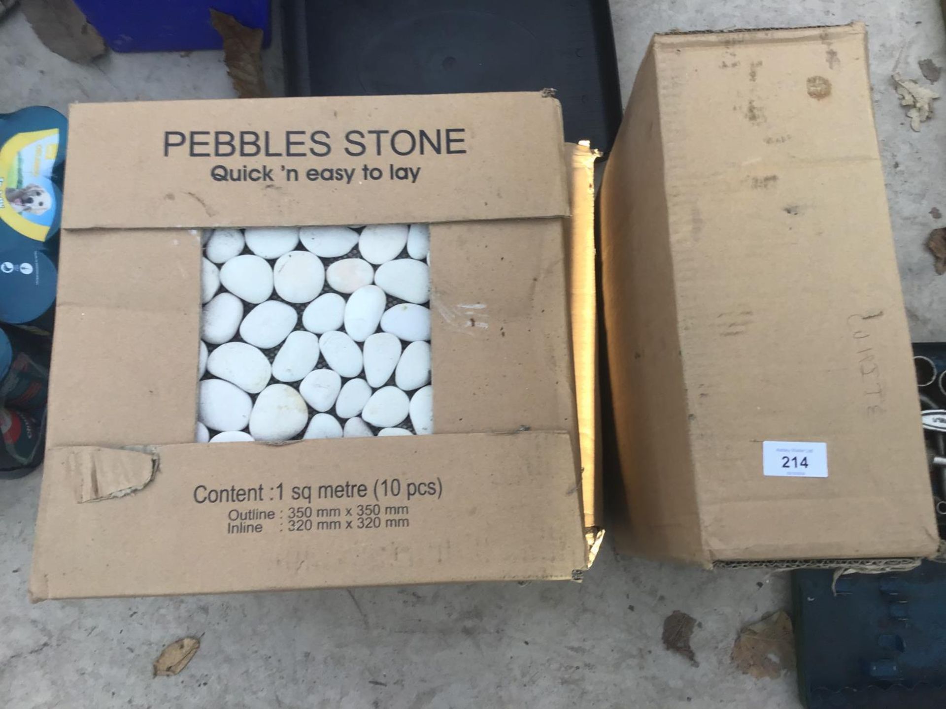 THREE BOXES CONTAINING ONE SQUARE METRE EACH OF PEBBLES STONE TILES