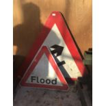 TWO WARNING SIGNS TO INCLUDE A FLOOD