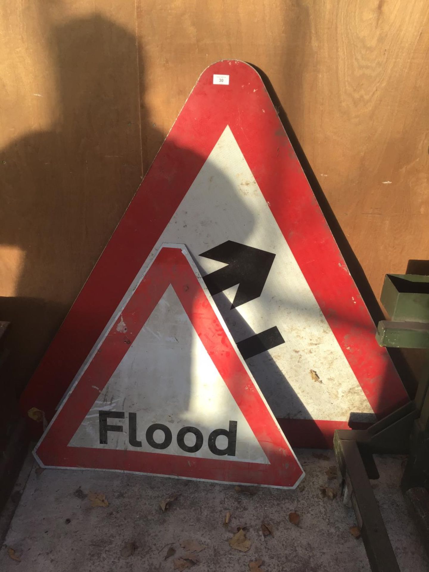 TWO WARNING SIGNS TO INCLUDE A FLOOD