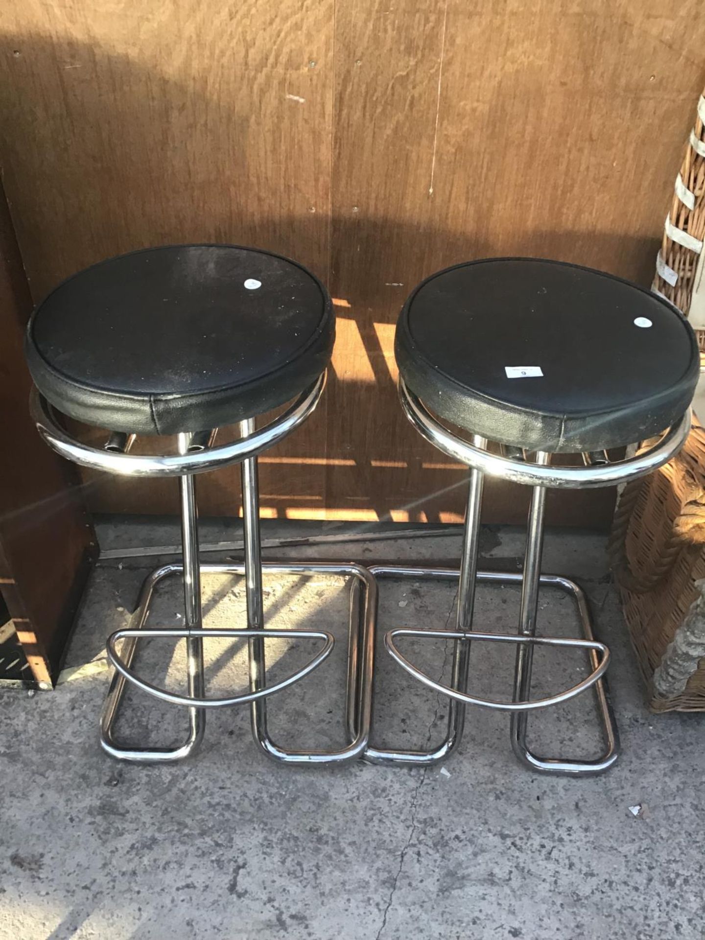 A PAIR OF CHROME FRAMED BAR STOOLS WITH BLACK LEATHERETTE SEATS - Image 2 of 2