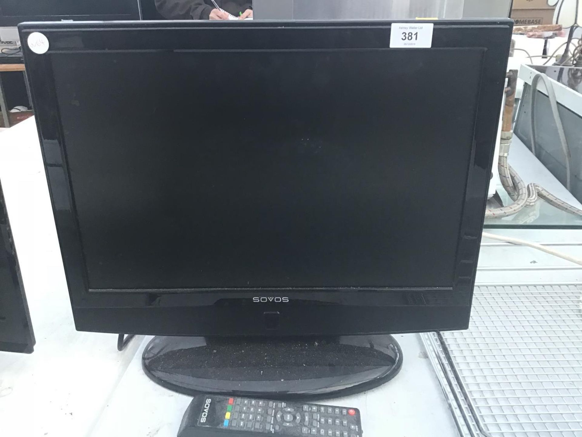 A SOVOS 19 INCH TELEVISION WITH REMOTE CONTROL IN WORKING ORDER