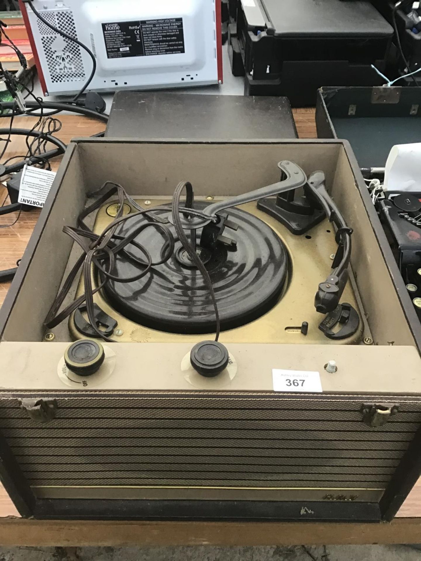 A VINTAGE RECORD PLAYER IN CASE IN WORKING ORDER