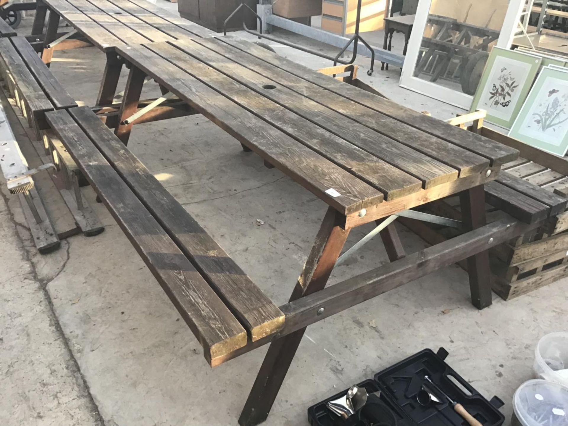 A WOODEN PICNIC BENCH