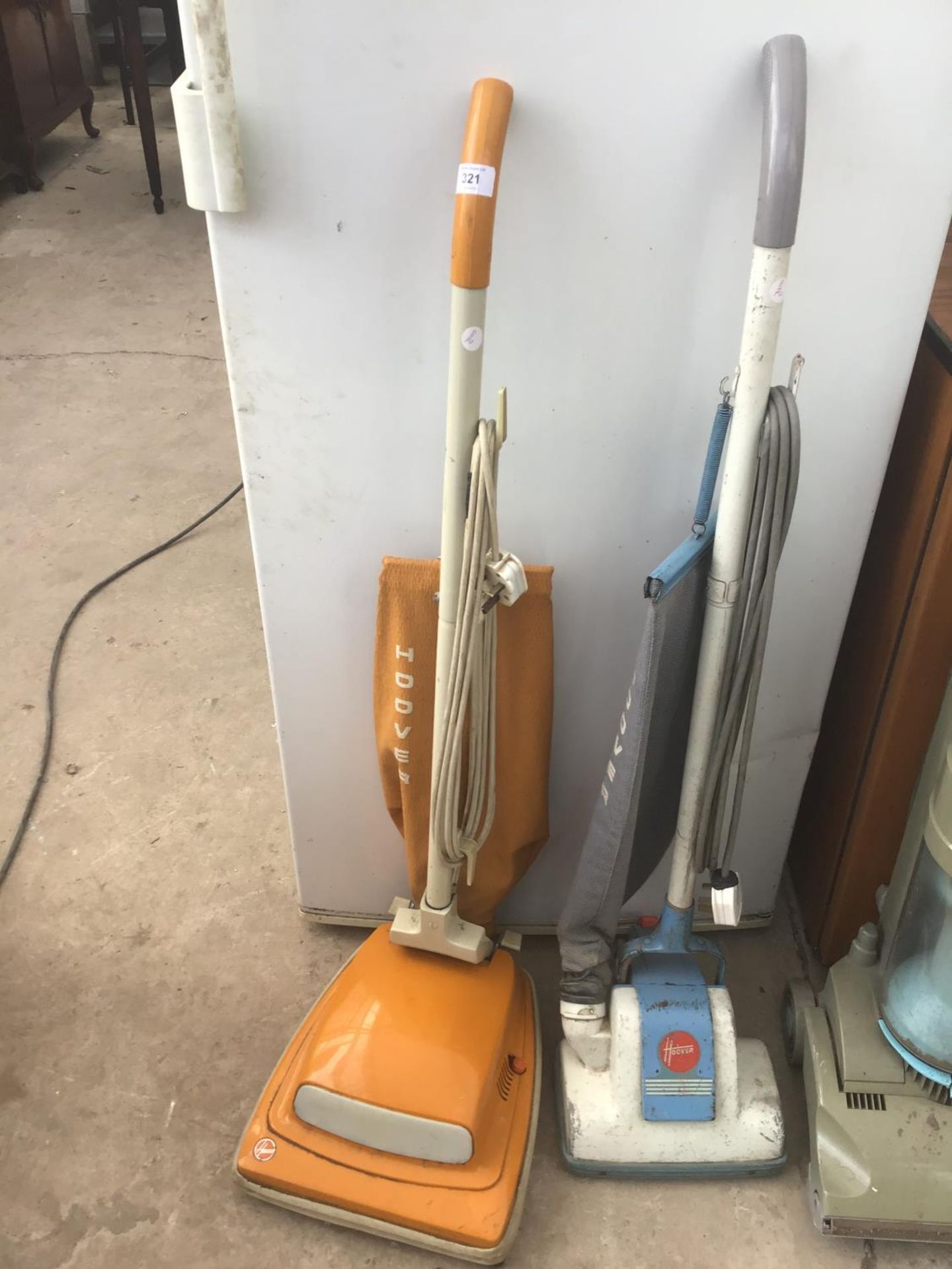 TWO HOOVER VACUUM CLEANERS IN WORKING ORDER