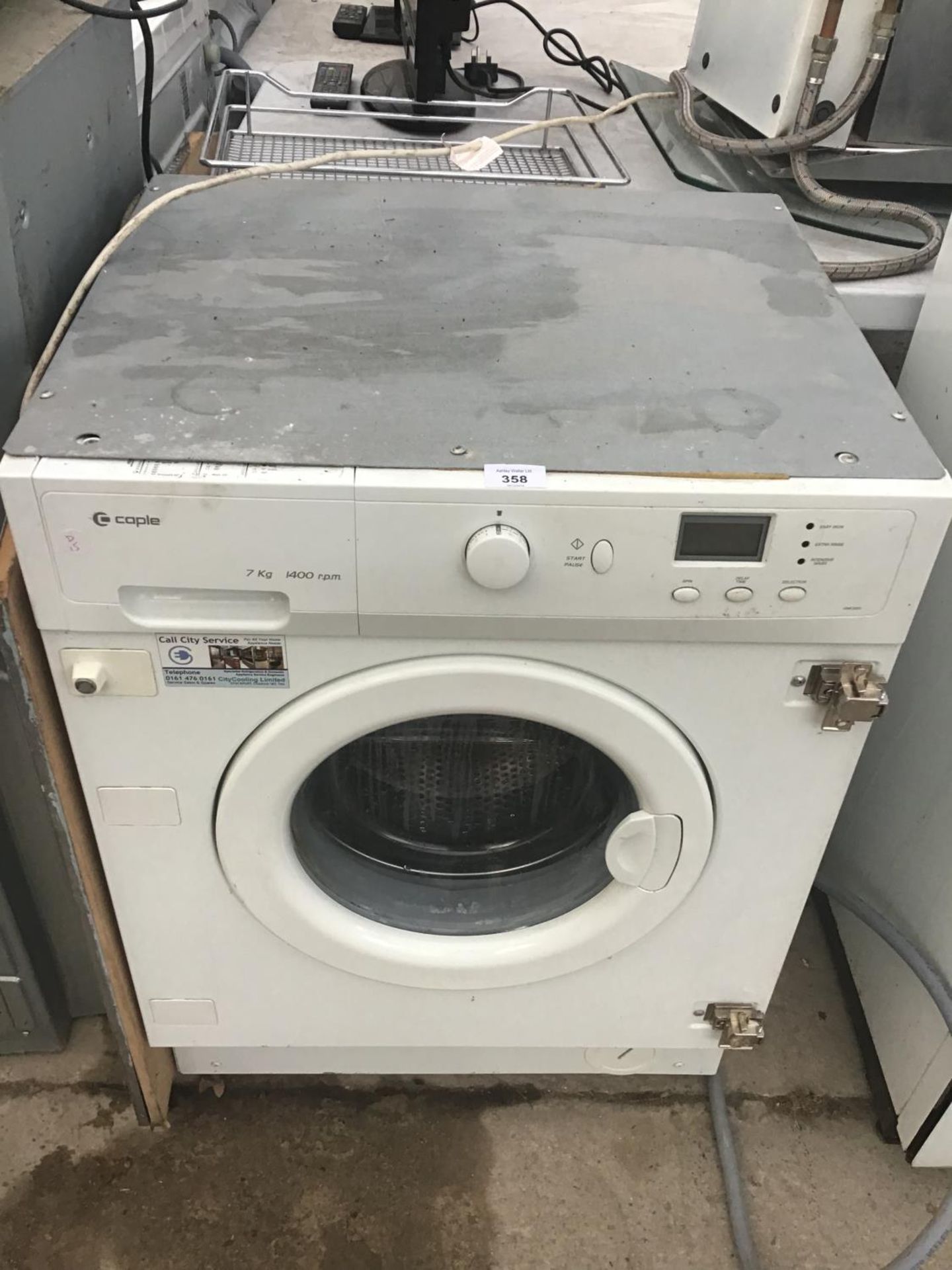 AN INTEGRATED COPLE WASHER IN WORKING ORDER