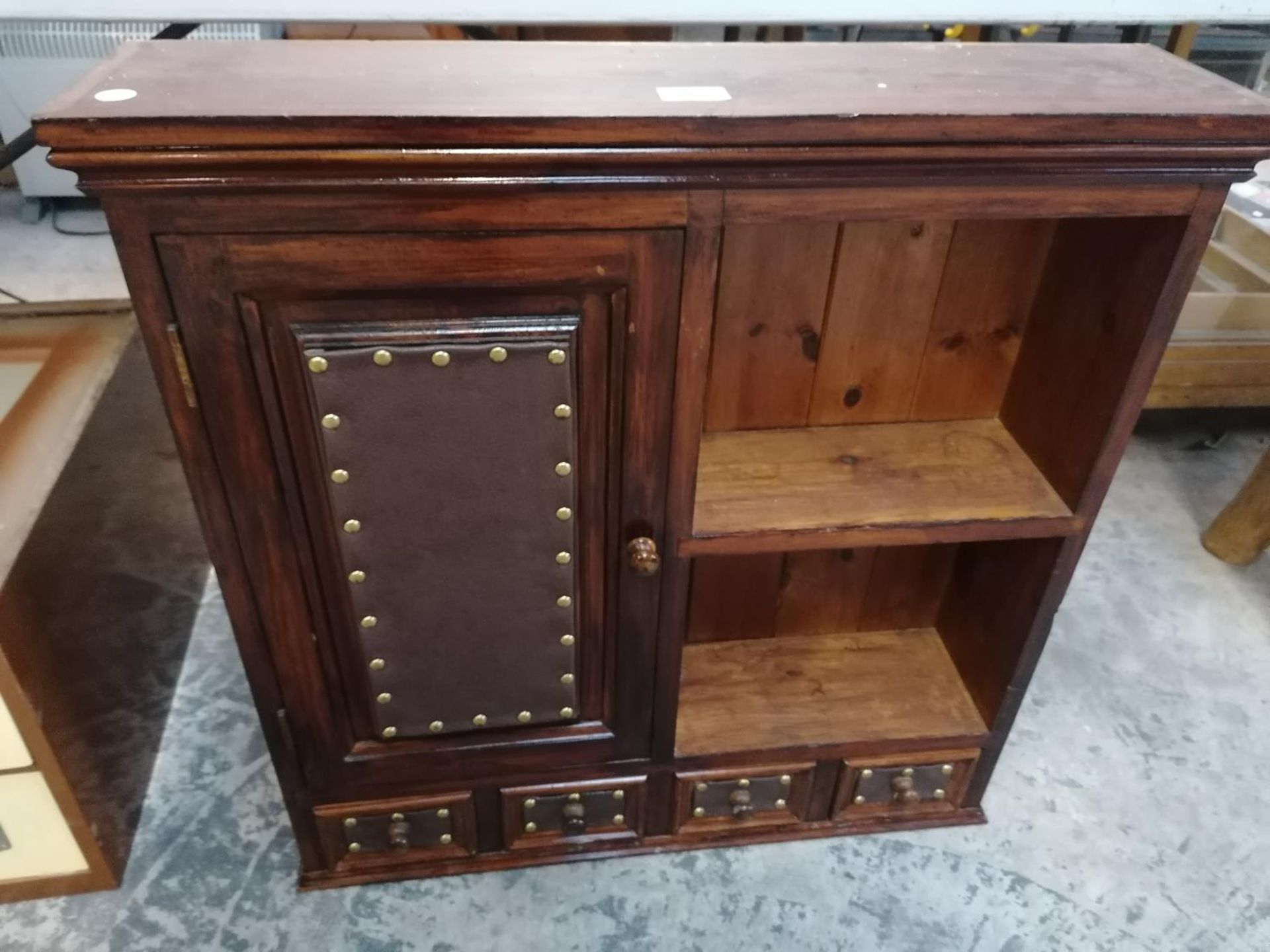 A VINTAGE STYLE HARDWOOD CABINET WITH SINGLE DOOR AND LOWER FOUR DRAWERS