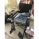 AN AS NEW INVACARE WHEELCHAIR WITH CUSHION