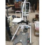 A OXFORD MIDI 170 HOIST WITH BATTERY AND CHARGER, A SHOWER STOOL AND A RE TURN 7500 BASE