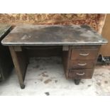 A VINTAGE HEAVY DUTY METAL WORKBENCH WITH THREE SIDE DRAWERS 122CM X 78CM