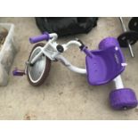 AN ELECTRA TRICYCLE IN LILAC