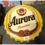 A METAL 'AURORA' BEER BOTTLE CAP SIGN, DIAMETER 35CM