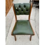 A GREEN LEATHER AND MAHOGANY BUTTON BACK STUDY CHAIR
