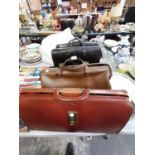 FOUR VINTAGE LEATHER BRIEFCASES