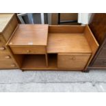 A TEAK CABINET WITH ONE DOOR AND ONE DRAWER