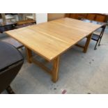 A PINE DINING TABLE