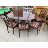 A MAHOGANY EXTENDING DINING TABLE AND SIX MAHOGANY DINING CHAIRS