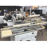 A LARGE COLLECTION OF KNITTING MACHINES AND PARTS TO INCLUDE BROTHER ALONG WITH PATTERNS,