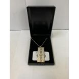 A BOXED SILVER INGOT NECKLACE