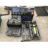 A CASED TWO TONNE JACK, DRILL, AND A TOOL BOX WITH CONTENTS TO INCLUDE SPANNERS, PLIERS, SOCKETS ETC