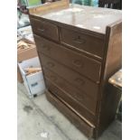 A VINTAGE CHEST OF TWO SHORT AND FIVE LONG DRAWERS