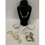 A COLLECTION OF SILVER BRACELETS AND NECKLACES