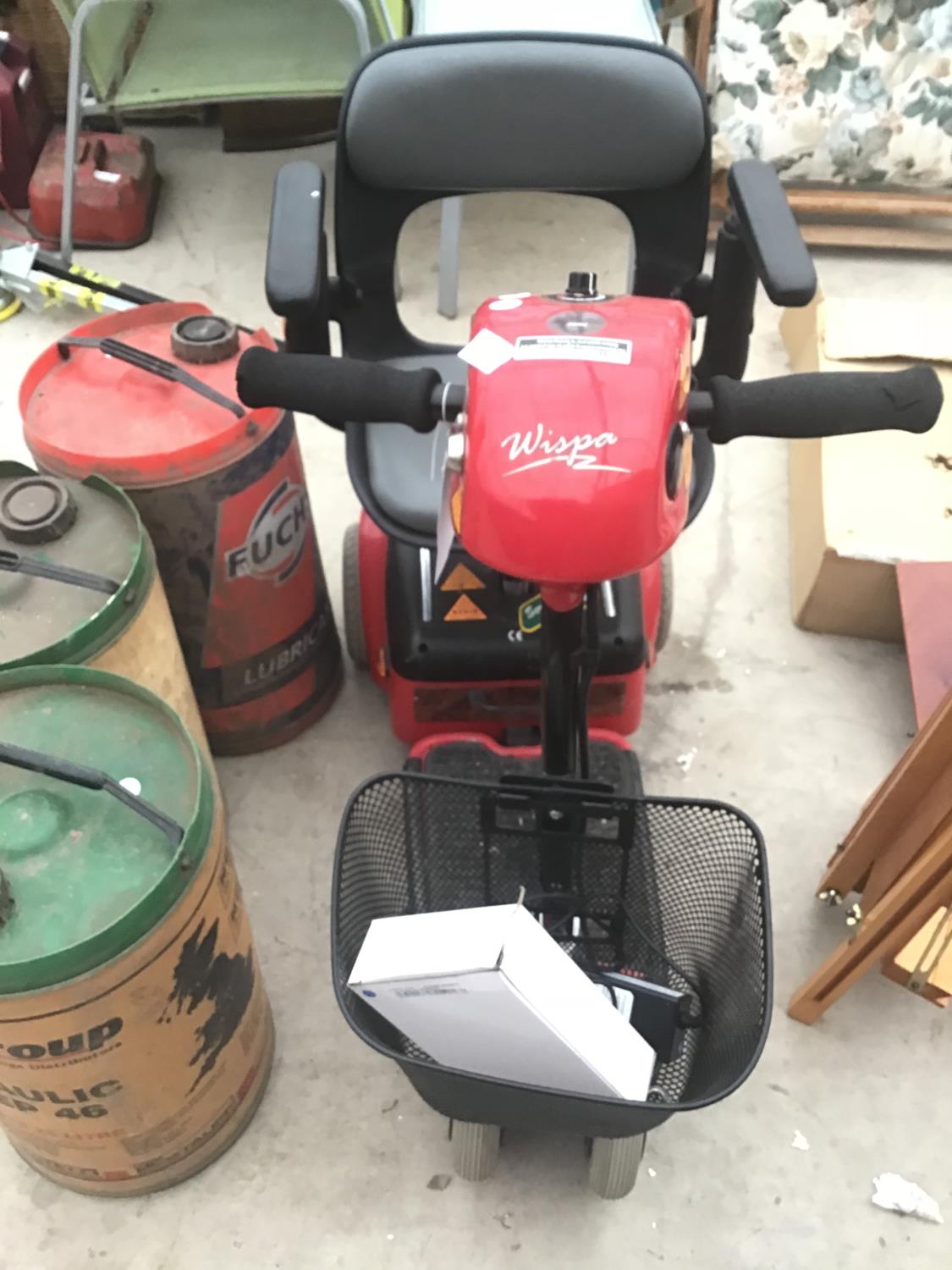 A WISPA MOBILITY SCOOTER WITH CHARGER IN CLEAN AND WORKING ORDER