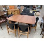 A RETRO EXTENDING TEAK DINING TABLE AND SIX TEAK DINING CHAIRS