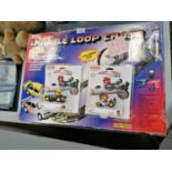 AN 'ARTN' REMOTE CONTROL SCALEXTRIC STYLE CHILDREN'S GAME TOGETHER WITH TWO NEW SUPER MARIO DS