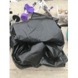 A LARGE QUANTITY OF BLACK SUPPRESSANT SHEETING