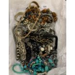 A LARGE COLLECTION OF ASSORTED COSTUME JEWELLERY