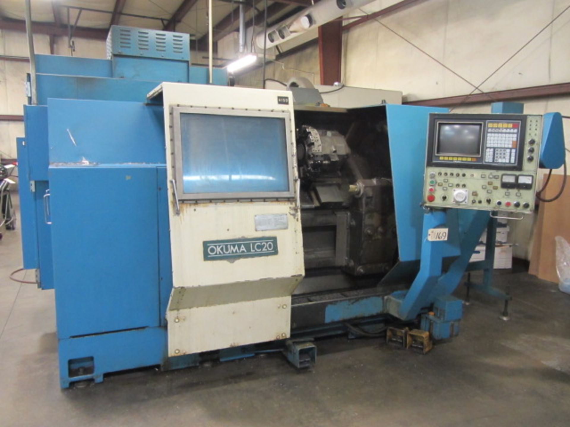 Okuma LC20 CNC Turning Center with 10'' 3-Jaw Power Chuck, 24'' Max Distance to Tailstock, Spindle
