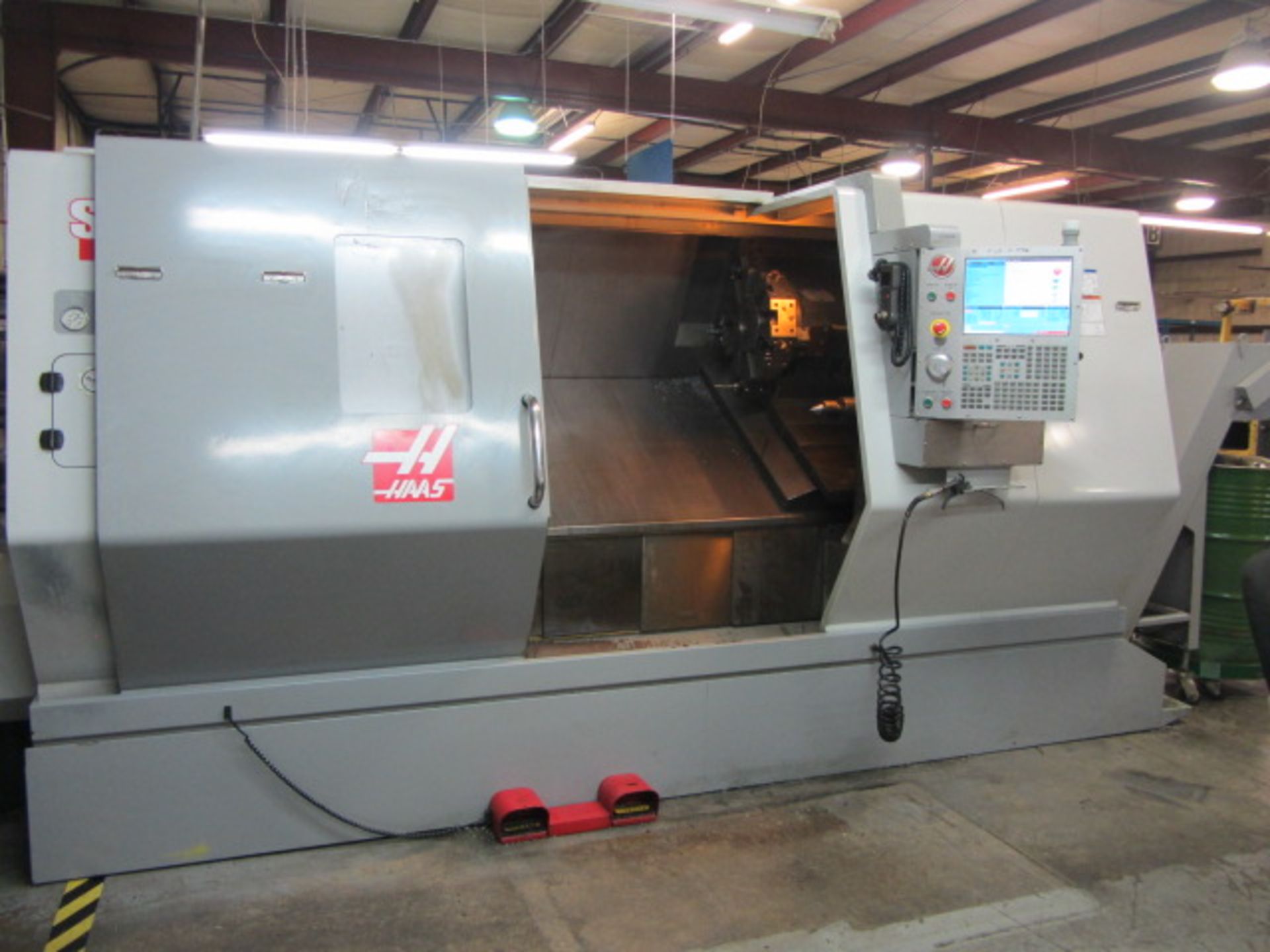 Haas SL40 CNC Turning Center with 15'' 3-Jaw Power Chuck, 4-1/2'' Bore, Approx 70'' Max Distance
