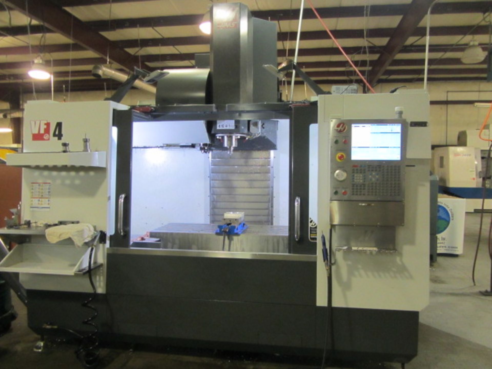 Haas VF-4 CNC Vertical Machining Center with 52'' x 20'' Table, #40 Taper Spindle Speeds to 8100 - Bild 3 aus 8