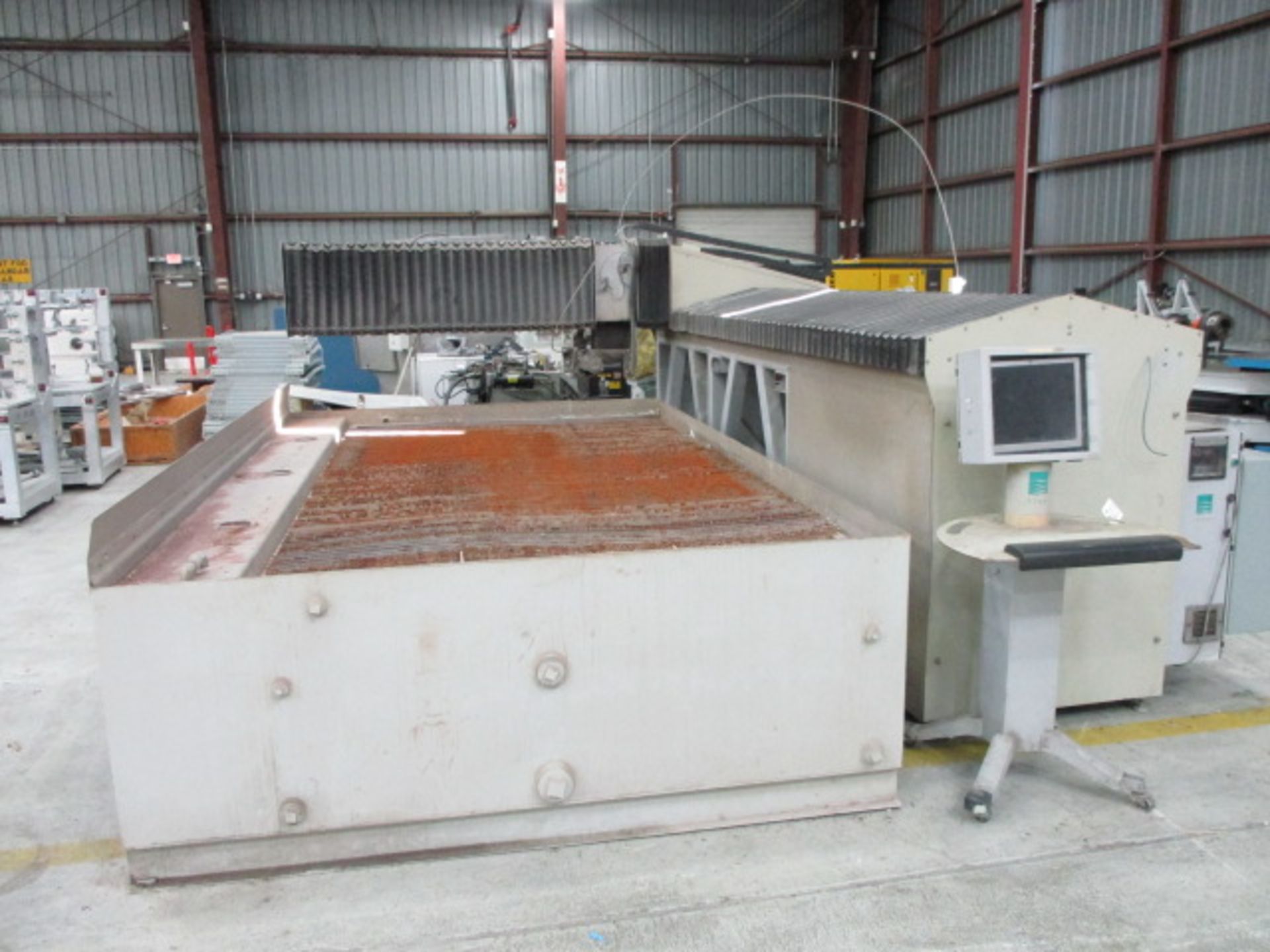 Flow 6' x 12' 3-Axis CNC Water Jet Machining Center with 60,000 PSI, 6' x 12' Water Table &