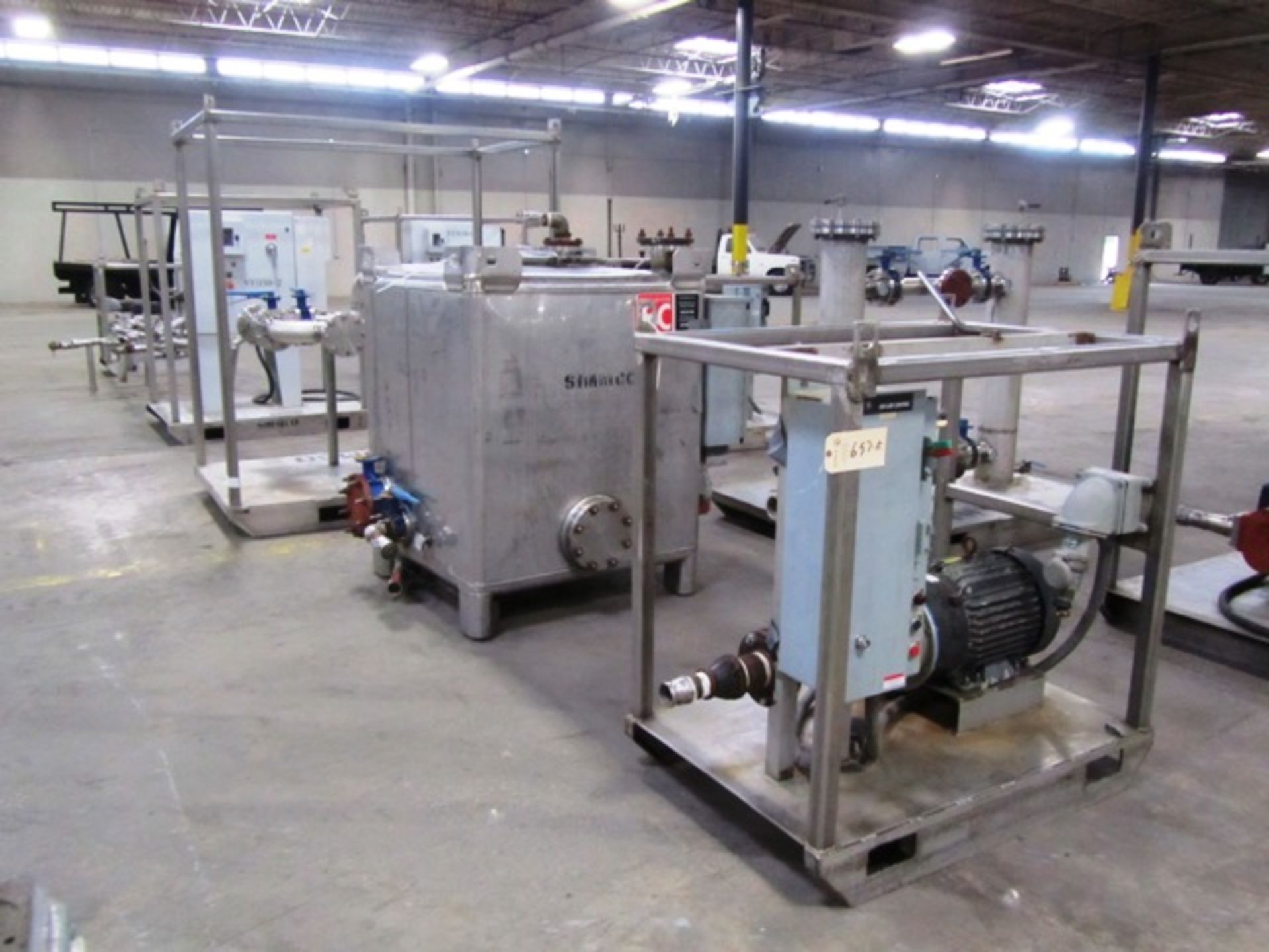 Oil / Water Bypass Pumping System consisting of (2) 25 HP Motors, (1) Splitter Valve Station with