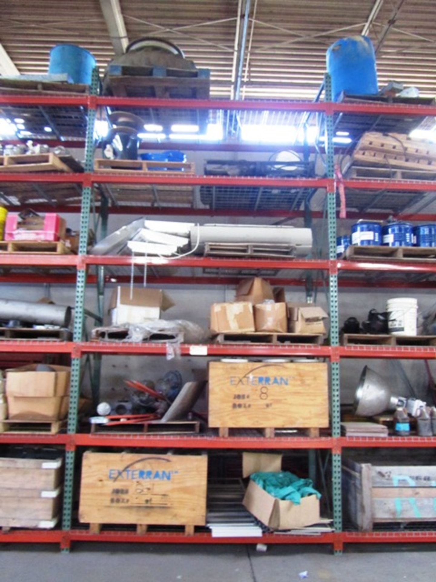 Contents of 6 Vertical Sections Pallet Racking consisting of Tractor Tire with Rim, Lights, Crates