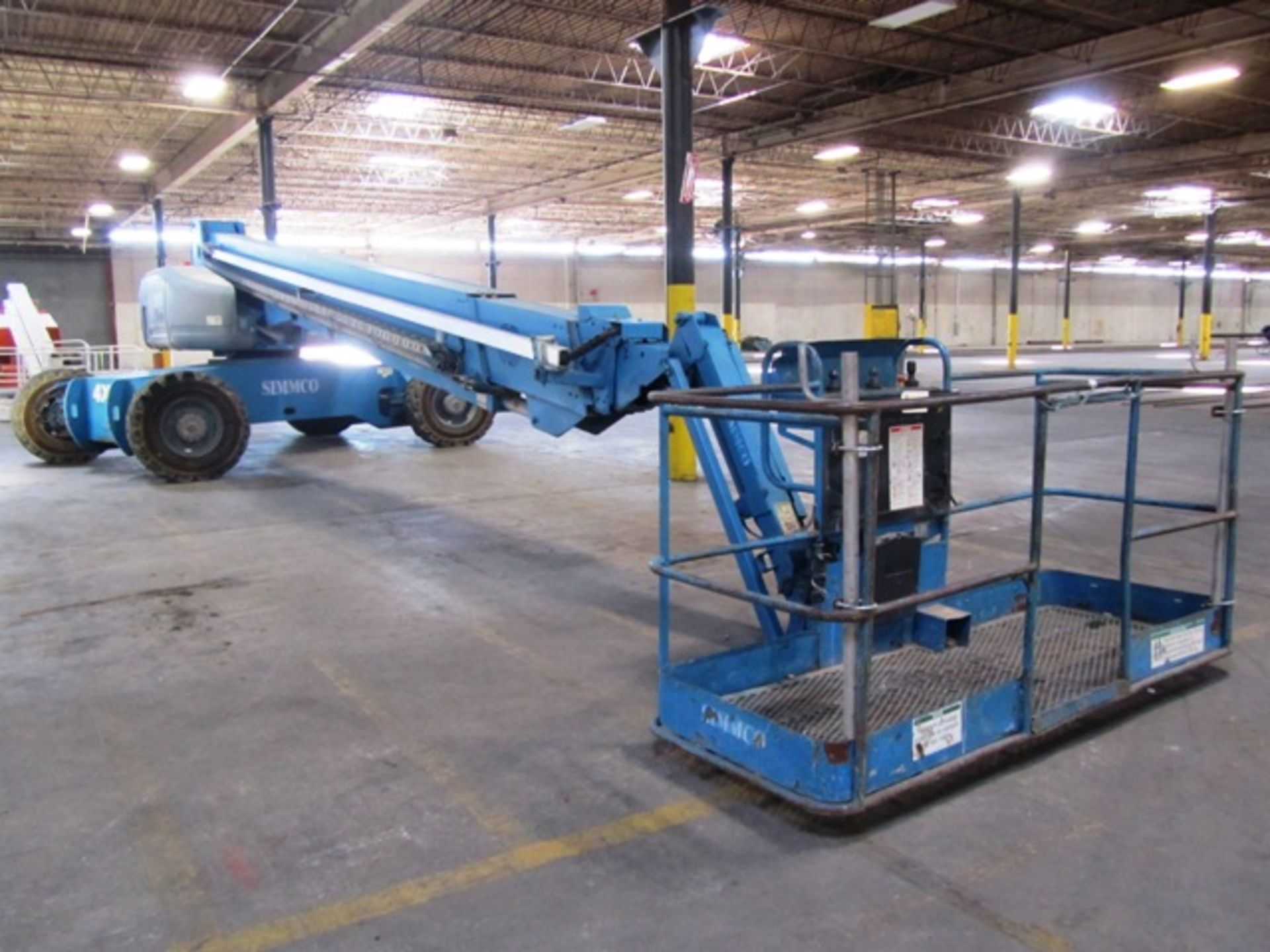 Genie Model S125 Diesel Telescopic Boom Platform Lift with 125' Reach, Rough Terrain Tires, Joystick