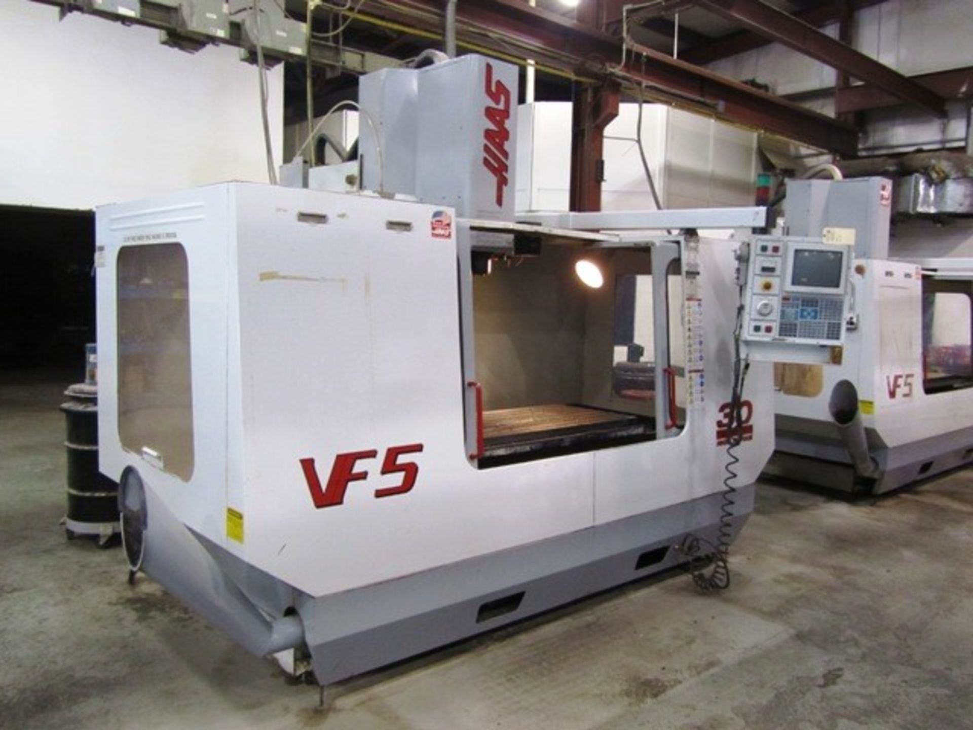 Haas VF5 CNC 4-Axis Vertical Machining Center with 64" x 28" Table, 50"-X, 26"-Y, 25"-Z-Axis