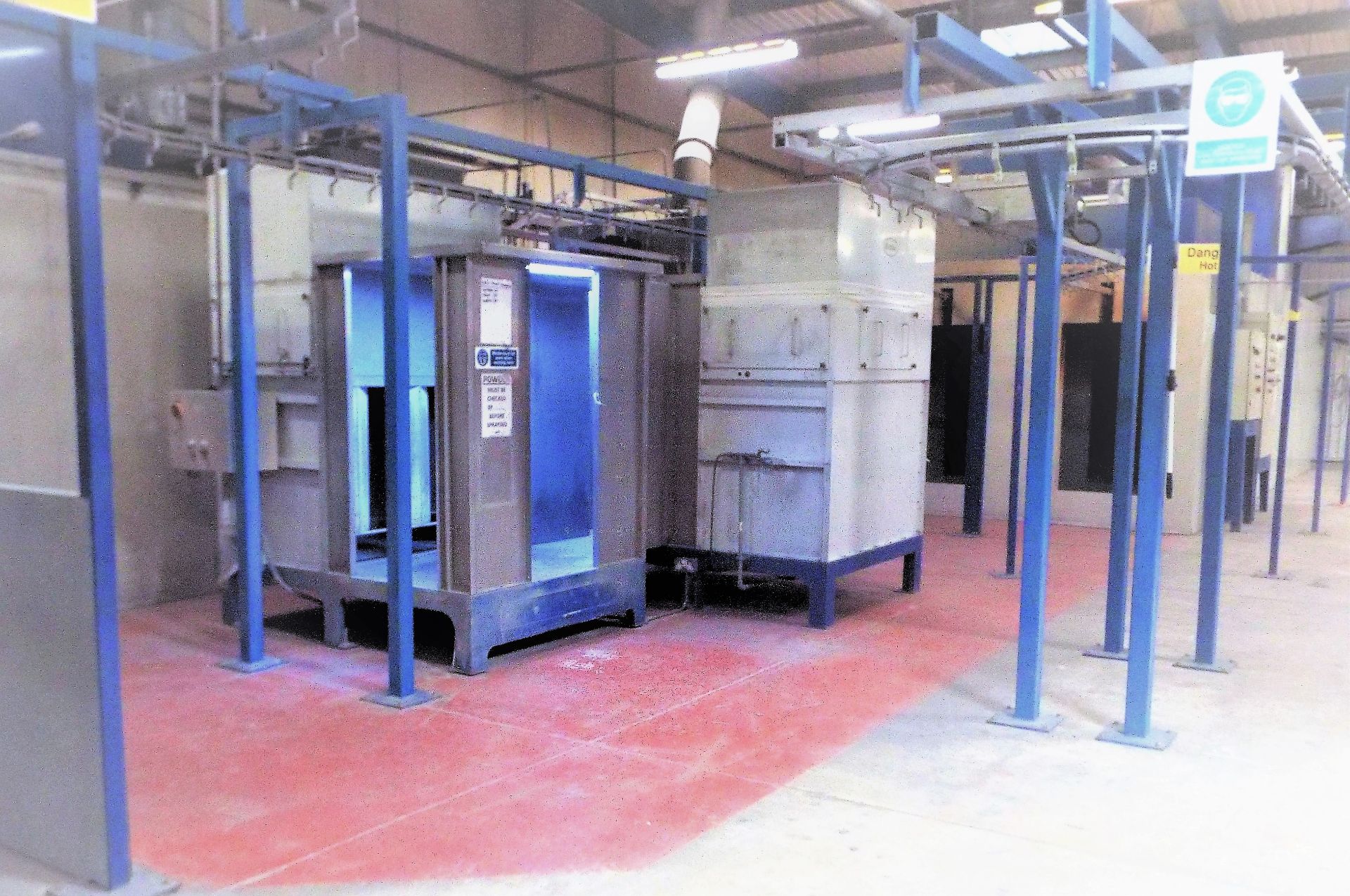 The Complete Contents Of A Powder Coating Line Featuring On Line Pre-Treatment.