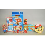 A quantity of Nintendo Super Mario Bros items: Micro Games USA Walkie Talkie; Zeon Watch;