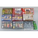 Eight Victrix 28mm plastic figure sets, together with one building. E.