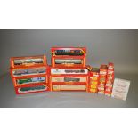 OO Gauge Thirty boxed items of rolling stock by Hornby Railways, including R.105 Birds Eye Van, R.