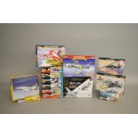 Fifteen plastic model kits, all 1:72 scale aircraft, by MisterCraft, PM Model and similar.