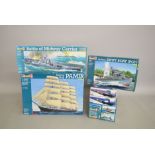 Seven plastic model kits, all boats,