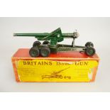 A boxed Britains 155mm Gun, appears F in F lidded card box with yellow label affixed to top of lid.