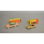 Two boxed Dinky Toys diecast model cars,