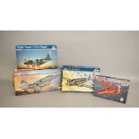 Four Italeri plastic model kits, all aircraft: 2504 F-104 A/C Starfighter 1:32 scale; 1311 G.